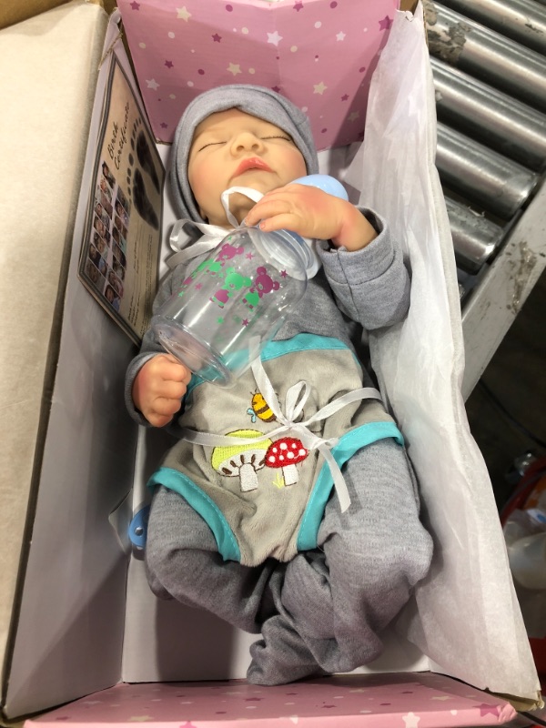 Photo 2 of Reborn Baby Doll, 22 Inch Cute Soft Vinyl Silicone Baby Boy Doll Handmade Lifelike Weighed Reborn Boy Doll (Not same as stock)