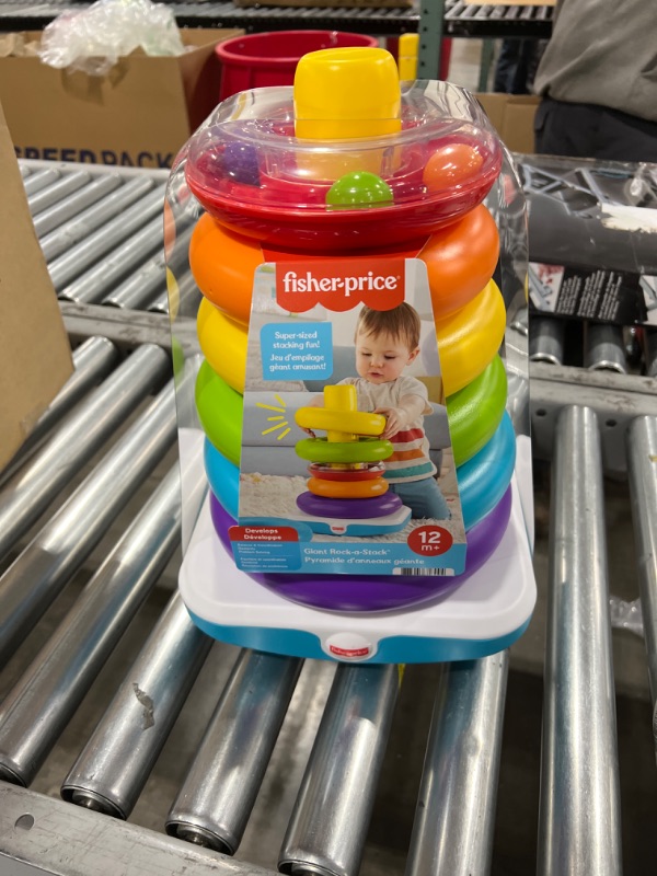 Photo 2 of Fisher-Price Giant Rock-a-Stack, 14-inch Tall Stacking Toy with 6 Colorful Rings for Baby to Grasp, Shake, and Stack
