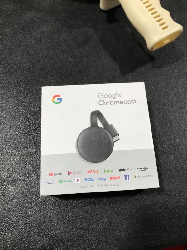 Photo 2 of Google Chromecast - Streaming Device with HDMI Cable - Stream Shows, Music, Photos, and Sports from Your Phone to Your TV