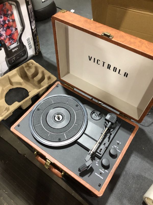 Photo 2 of Victrola Vintage 3-Speed Bluetooth Portable Suitcase Record Player with Built-in Speakers | Upgraded Turntable Audio Sound| Includes Extra Stylus | Brown