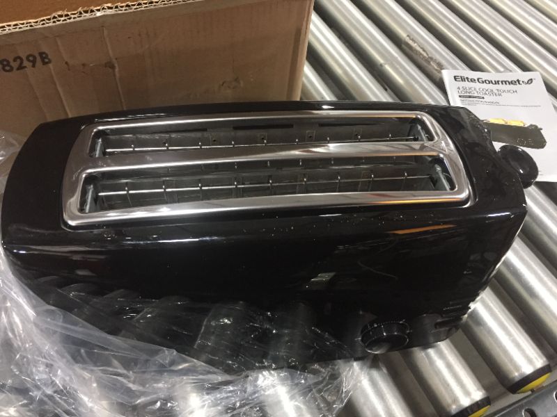 Photo 1 of Elite Gourmet ECT-4829B Long Toaster, 6 Toast Settings Defrost, Reheat, Cancel Functions, Slide Out Crumb Tray, Extra Wide Slots for Bagels Waffles, 4-Slice, Black

