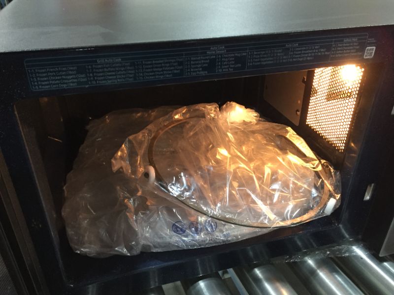 Photo 1 of Samsung - 1.1 cu. ft. Countertop Microwave with Grilling Element - Charcoal
