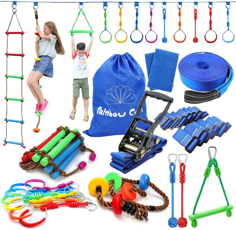 Photo 1 of Rainbow Craft Ninja Line Obstacle Course for Kids Backyard Training- High Strength Towing Strap Grade Ninjaline, 7pc Ninja Rings, Climbing Rope Ladder, Climbing Rope, Monkey Bar&2pc Ninja Fists Holds