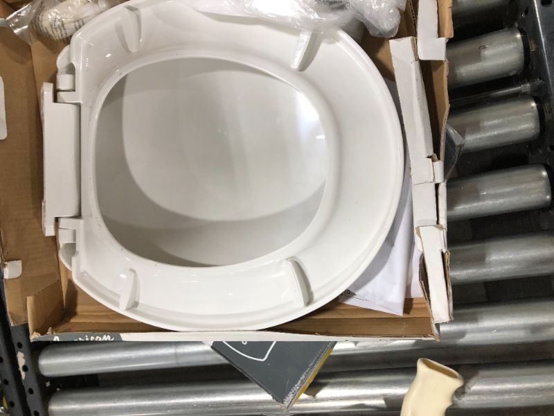 Photo 3 of American Standard Mainstream White Round Slow-Close Toilet Seat
