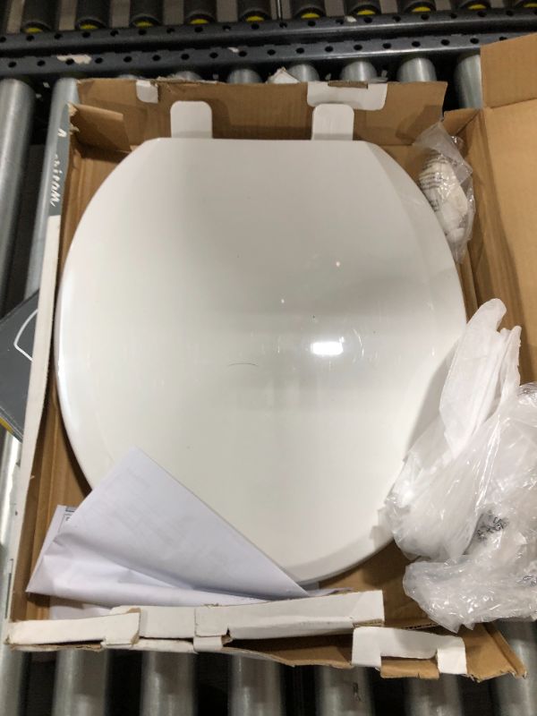 Photo 2 of American Standard Mainstream White Round Slow-Close Toilet Seat
