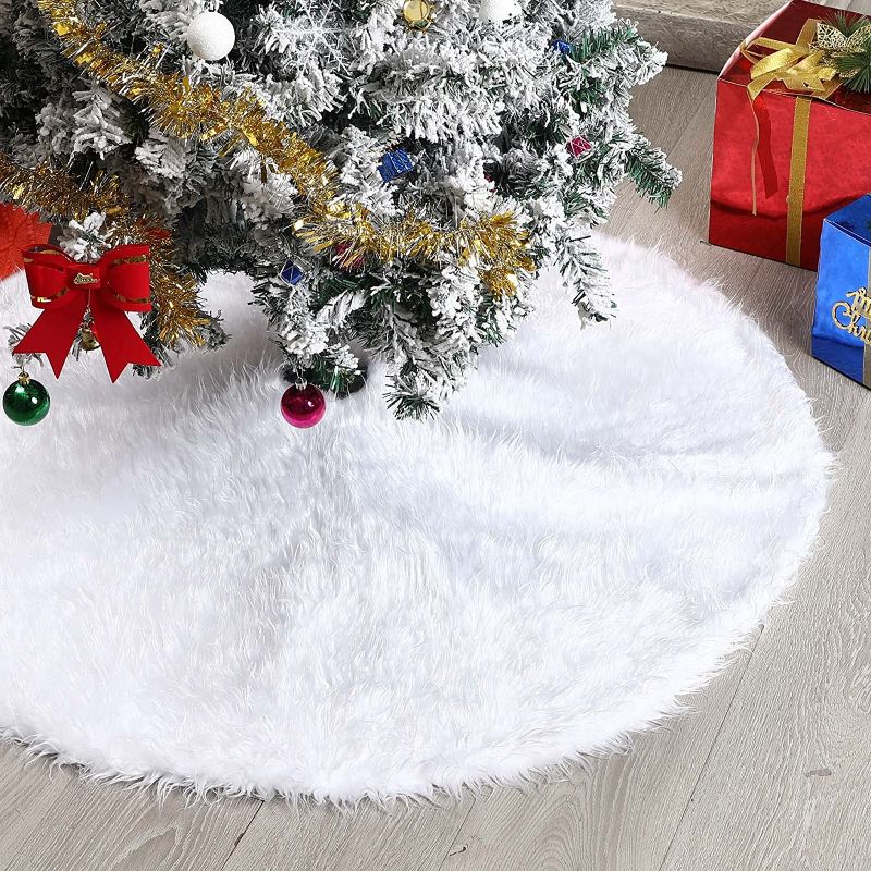 Photo 1 of Alloirl 48 Inch Christmas Tree Skirt, White Faux Fur Tree Skirt Decorations for Merry Christmas Party Tree, Plush Fluffy Christmas Tree Skirt Decor (White, 48 Inch)
