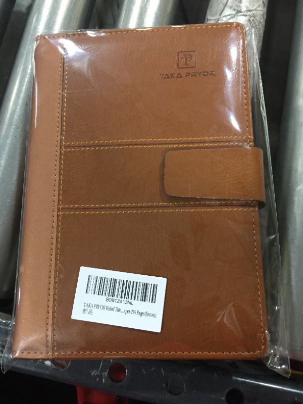 Photo 1 of TAKA PRYOR Thick Ruled Journal/Refillable Faux Leather Lined Hardcover Executive Notebooks ?Pen Holder?Medium 5.7 x 8.5 inches ?100 GSM Thick Paper 300 Pages(Brown)
