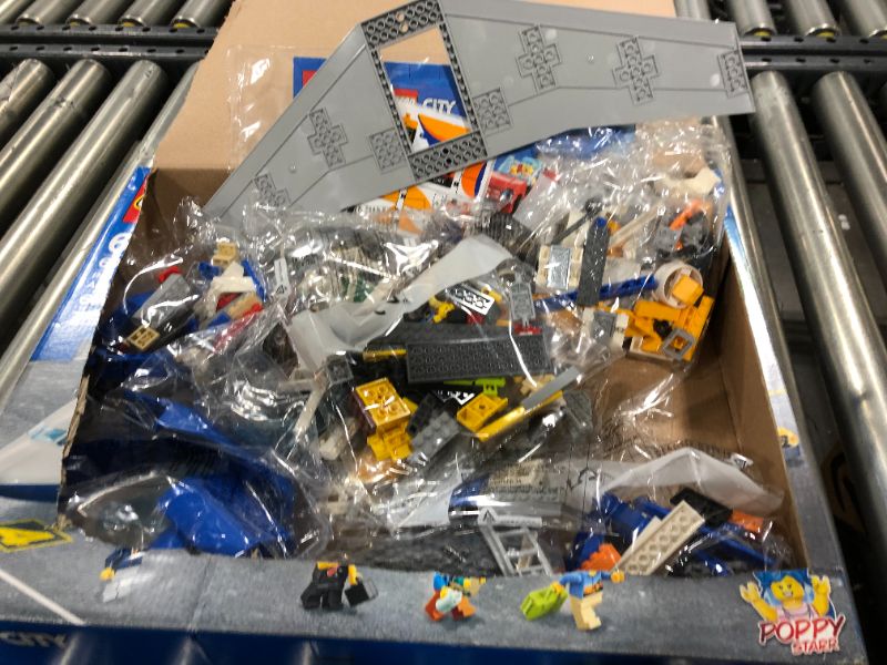 Photo 2 of LEGO City Passenger Airplane 60262, with Radar Tower, Airport Truck with a Car Elevator, Red Convertible, 4 Passenger and 4 Airport Staff Minifigures, Plus a Baby Figure (669 Pieces)
