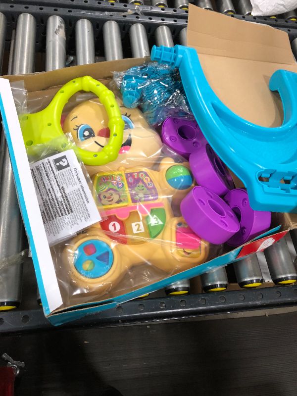 Photo 2 of Fisher-Price Laugh & Learn Smart Stages Learn with Sis Walker, Musical Walking Toy for Babies and Toddlers Ages 6 to 36 Months
