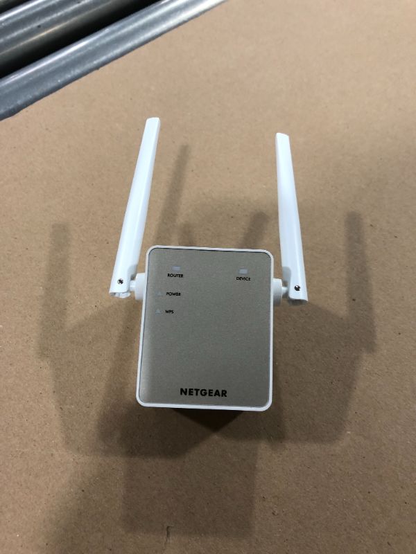 Photo 2 of NETGEAR Wi-Fi Range Extender EX6120 - Coverage Up to 1500 Sq Ft and 25 Devices with AC1200 Dual Band Wireless Signal Booster & Repeater (Up to 1200Mbps Speed), and Compact Wall Plug Design
