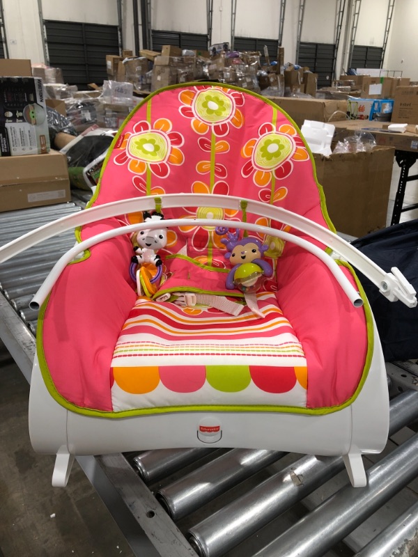 Photo 2 of Fisher-Price Infant-to-Toddler Rocker Floral Confetti, stationary baby seat and rocking chair with toys
