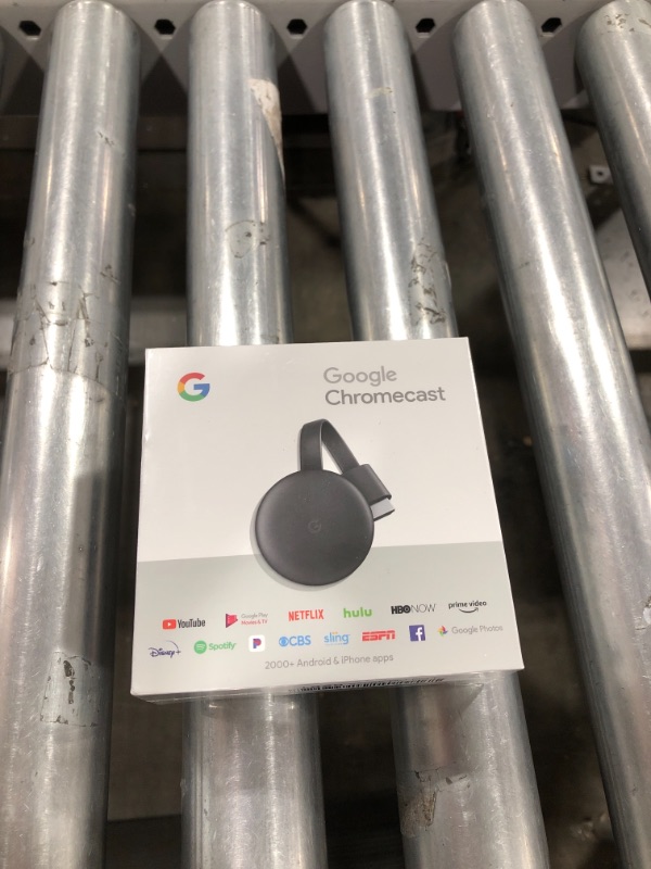 Photo 2 of Google Chromecast - Streaming Device with HDMI Cable - Stream Shows, Music, Photos, and Sports from Your Phone to Your TV
