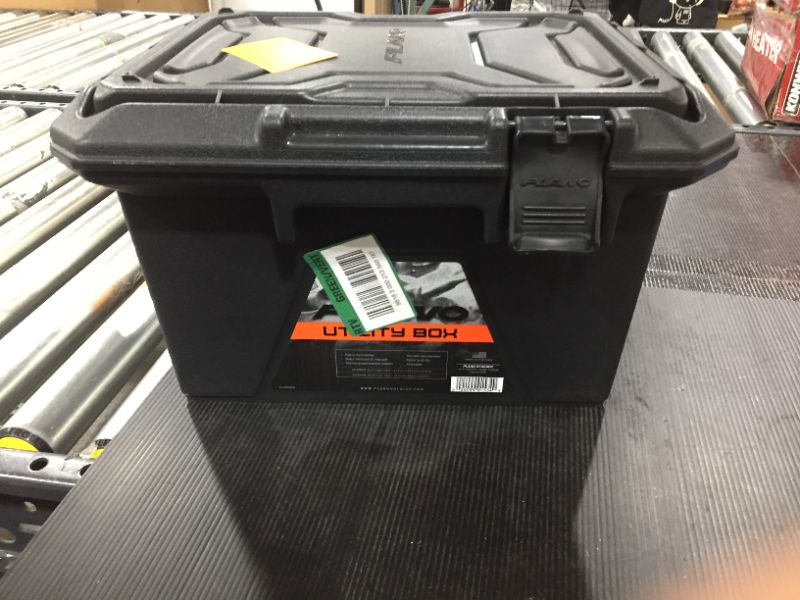 Photo 1 of black plano storage tool box 