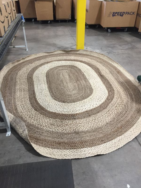 Photo 1 of 10' X 8' multi brown hued woven rug 