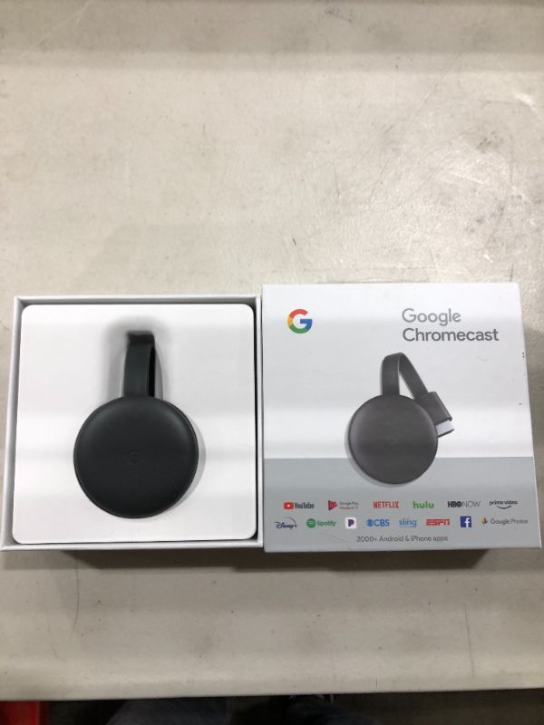 Photo 2 of Google Chromecast - Streaming Device with HDMI Cable - Stream Shows, Music, Photos, and Sports from Your Phone to Your TV
