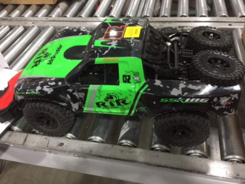 Photo 2 of Ruko C11 Amphibious RC Cars 1:10 Scale Large Monster Truck, 2.4 GHz Waterproof Remote Control Car, 4WD Off Road Vehicle with 2 Rechargeable Batteries for 40 Mins Play, Gift for Adults and Kids (Green)
