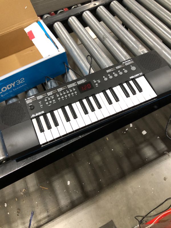 Photo 2 of Alesis Melody 32 – Electric Keyboard Digital Piano with 32 Keys, Speakers, 300 Sounds, 300 Rhythms, 40 Songs, USB-MIDI Connectivity and Piano Lesson