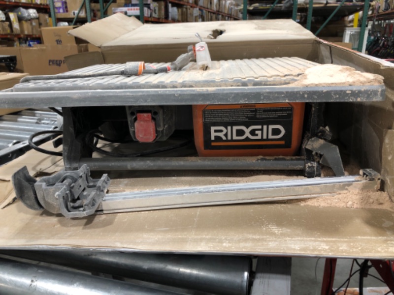 Photo 1 of Ridgid R4021 120-Volt 6.5 Amp Corded 7 Inch Self-Aligning Table Top Wet Tile Saw (New Open Box)