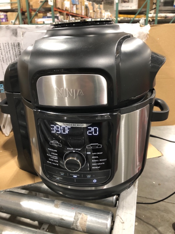 Photo 2 of Ninja FD401 Foodi 12-in-1 Deluxe XL 8 qt. Pressure Cooker & Air Fryer that Steams, Slow Cooks, Sears, Sautés, Dehydrates & More, with 5 qt. Crisper Basket, Deluxe Reversible Rack & Recipe Book, Silver
