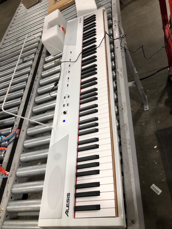 Photo 2 of Alesis Recital White | All White 88-Key Digital Piano / Keyboard with Full-Size Semi-Weighted Keys, Power Supply, Built-in Speakers and 5 Premium