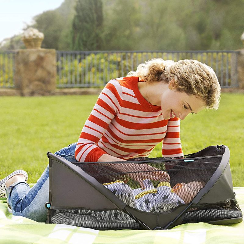 Photo 1 of Munchkin Brica Fold N' Go Travel Bassinet, Grey
