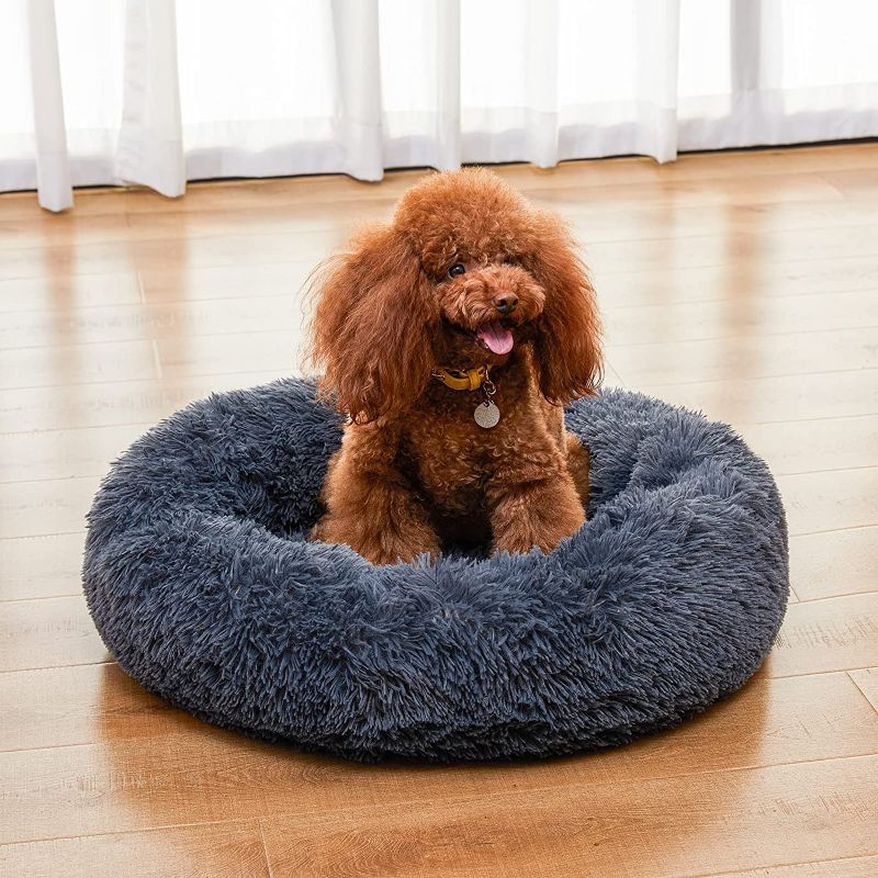 Photo 1 of Calming Dog Bed, Anti Anxiety Round Fluffy Dog and cat Sofa, Original Calming Dog Bed for Small Medium Large Pets, Warm and Washable Dog and cat Bed