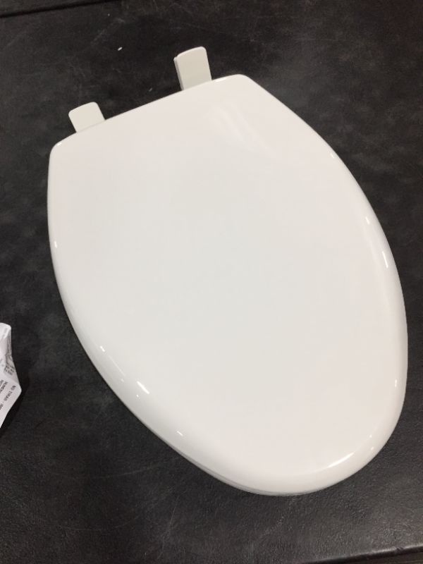 Photo 2 of  White Elongated Slow-Close Toilet Seat