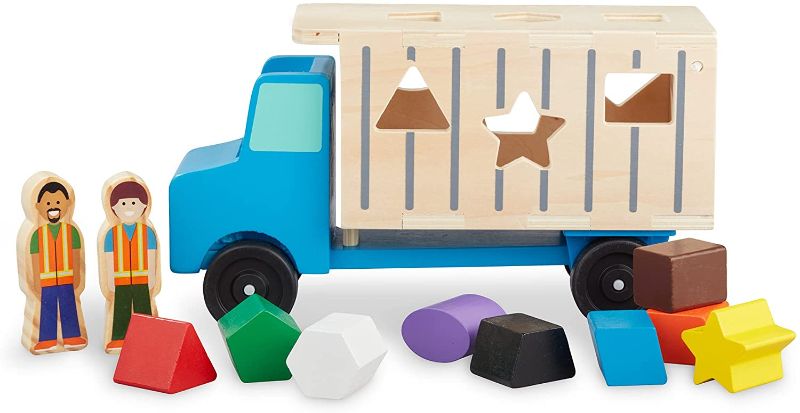 Photo 1 of Melissa & Doug Shape-Sorting Wooden Dump Truck Toy With 9 Colorful Shapes and 2 Play Figures