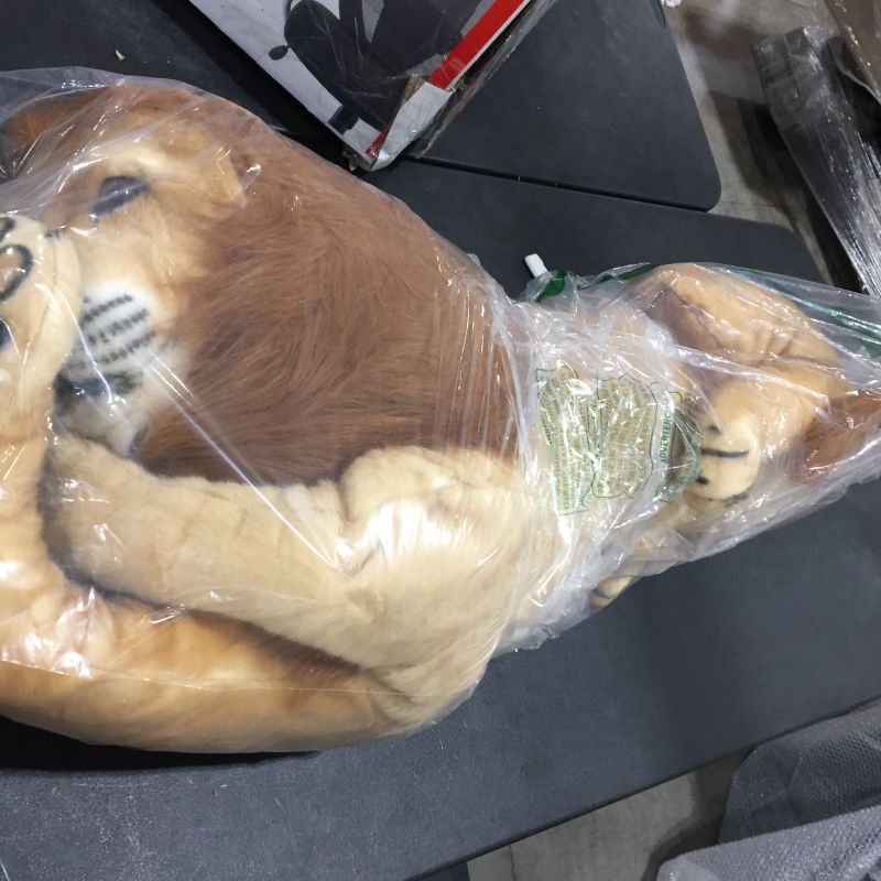 Photo 2 of  Melissa & Doug Giant Lion - Lifelike Stuffed Animal (over 6 feet long)