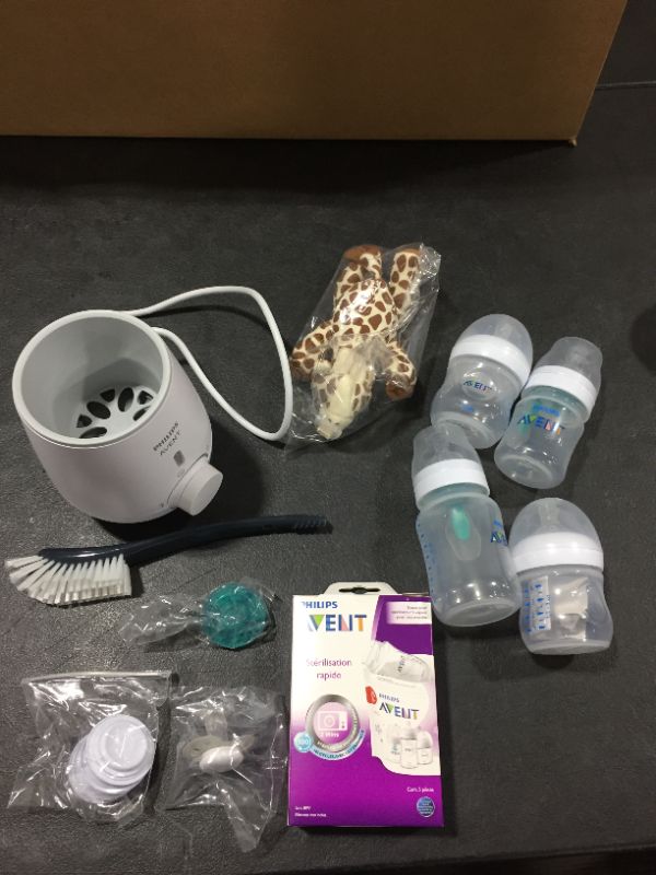 Photo 2 of Philips AVENT Anti-Colic Baby Bottle with AirFree Vent All in One Gift Set, SCD308/01, White (missing one bottle)