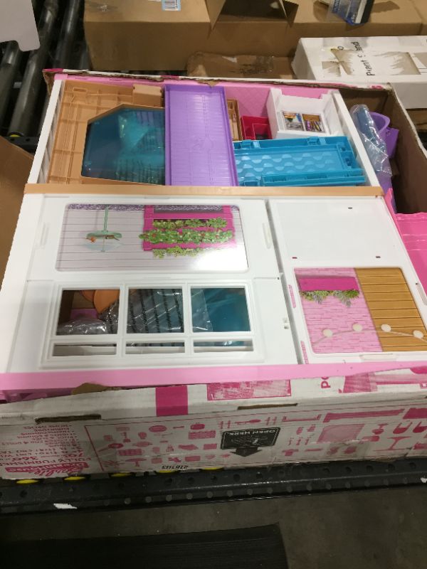 Photo 2 of Barbie Dreamhouse Dollhouse with Wheelchair Accessible Elevator, Pool, Slide and 70 Accessories Including Furniture and Household Items, Gift for 3 to 7 Year Olds
