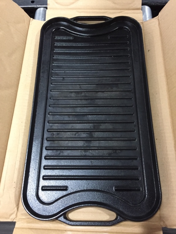 Photo 1 of CAST IRON REVERSIBLE GRIDDLE. USED CONDITION. RECTANGLE.