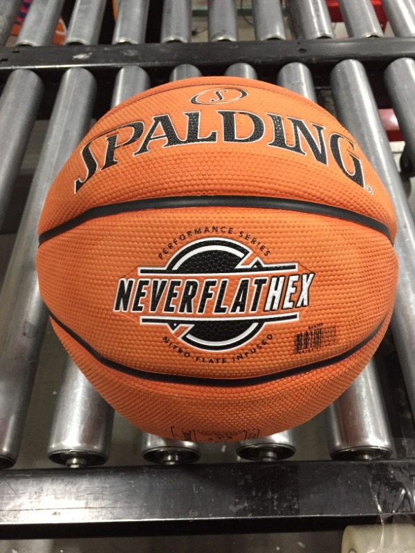 Photo 2 of Spalding SGT NeverFlat Hexagrip Indoor-Outdoor Basketball
NEEDS AIR.