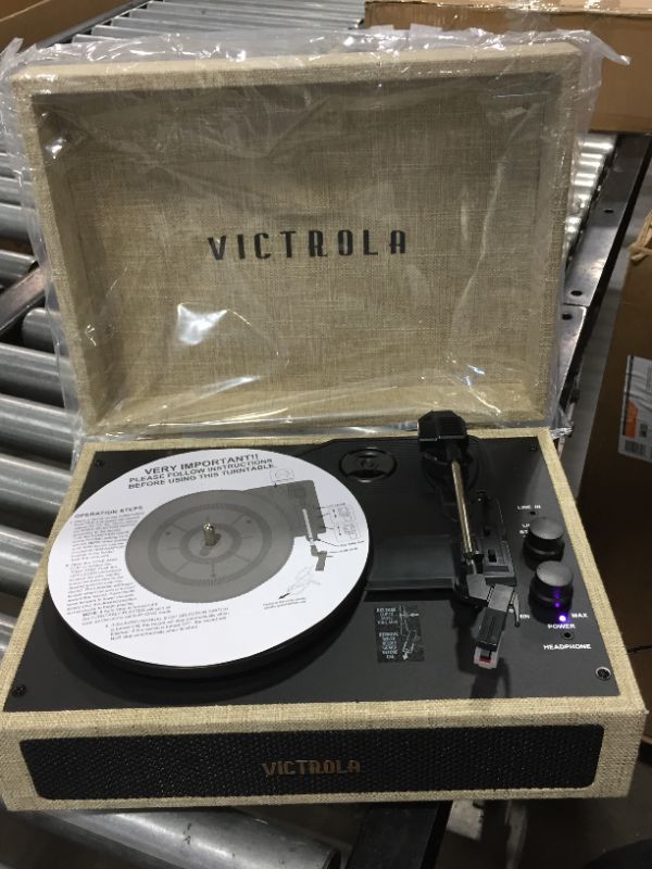 Photo 2 of Victrola Vintage 3-Speed Bluetooth Portable Suitcase Record Player with Built-in Speakers | Upgraded Turntable Audio Sound| Includes Extra Stylus | Light Beige Linen

