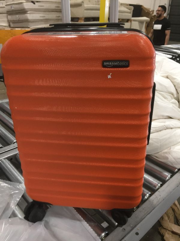 Photo 1 of Amazon Basics 21-Inch Hardside Spinner, Orange
