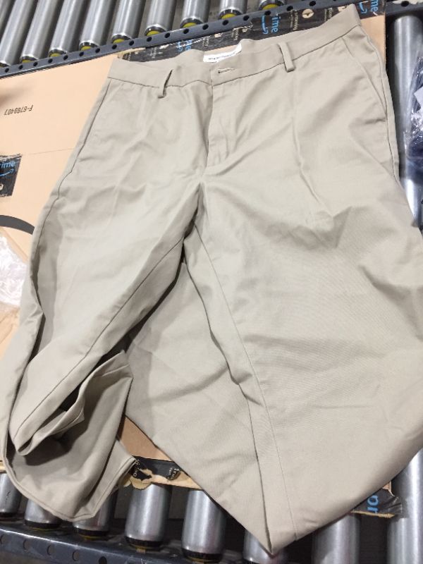 Photo 1 of Amazon Essentials Men's Big & Tall Loose-fit Wrinkle-Resistant Flat-Front Chino Pant fit 34w-32l