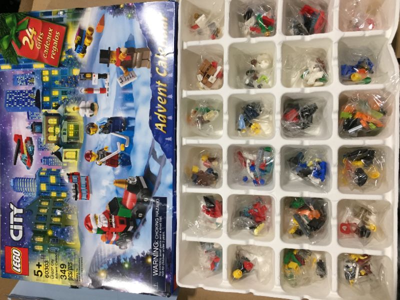 Photo 2 of LEGO City Advent Calendar 60303 Building Kit; Includes City Play Mat; Best Christmas Toys for Kids; New 2021 (349 Pieces)