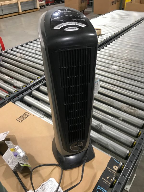 Photo 2 of Lasko 1500W Ceramic Tower Space Heater with Remote, 751320, Black/Silver