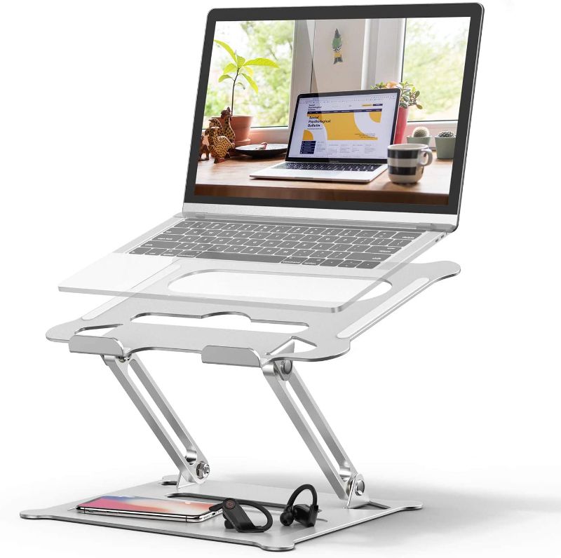 Photo 1 of Adjustable Laptop Stand, FYSMY Ergonomic Portable Computer Stand with Heat-Vent to Elevate Laptop, 13 Lbs Heavy Duty Laptop Holder Compatible with MacBook, Air, Pro All Laptops(Silver)