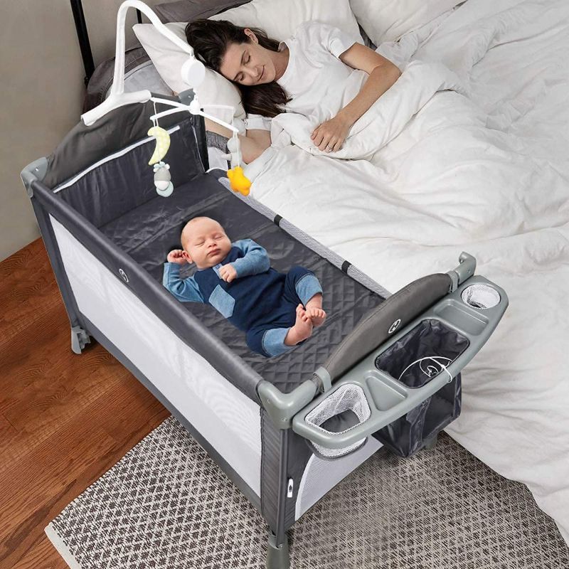 Photo 1 of BANIROMAY 5 in 1 Baby Bassinet Beside Sleeper, Baby Travel Crib with Mattress, Adjustable Portable Baby Bed for Newborn Boys Girls
