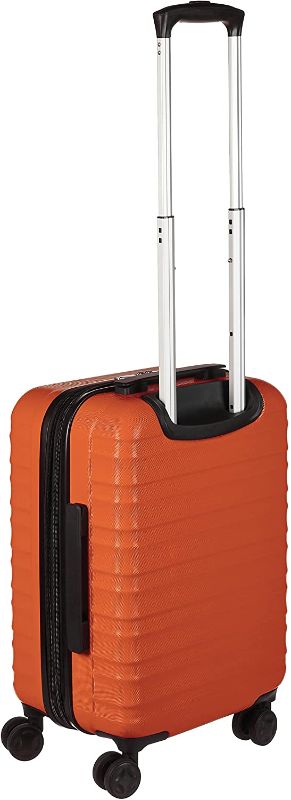 Photo 1 of Amazon Basics 21-Inch Hardside Spinner, Orange
