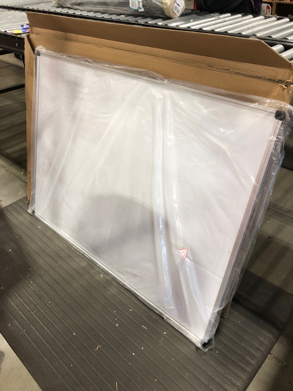 Photo 1 of XBoard Magnetic Whiteboard 48 x 36, White Board 4 x 3, Dry Erase Board with Detachable Marker Tray. DAMAGE TO BOARD SURFACE.
