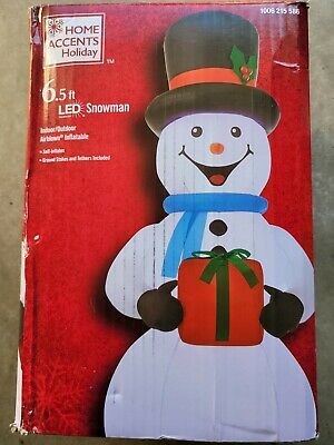 Photo 1 of Home Accents Holiday, 6.5 ft Pre-Lit LED Airblown Snowman Christmas Inflatable
