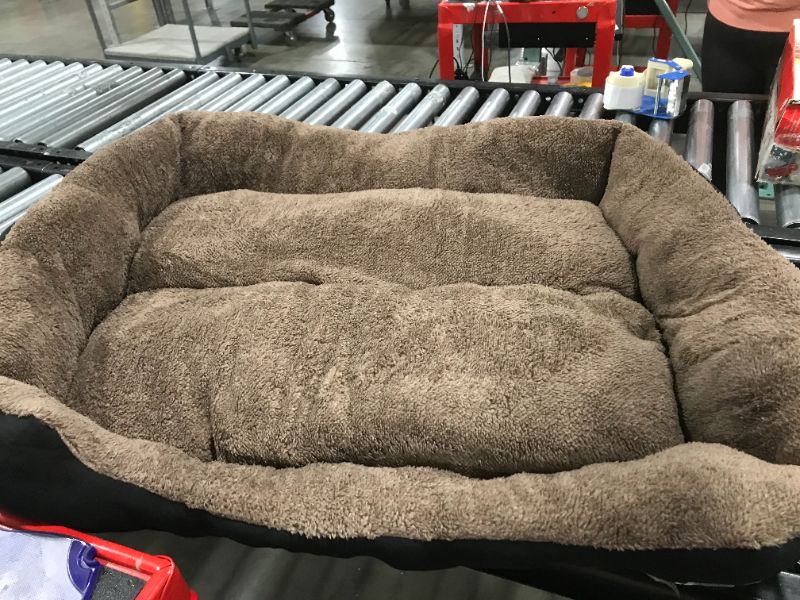 Photo 1 of black and brown dog bed