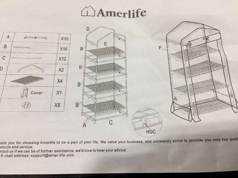Photo 3 of AMERLIFE 4 Tier Mini Greenhouse with Side Bags, Portable Green House with Zippered PVC Cover, Garden Yard Indoor Outdoor use, 63 x 28 x 20 Inches
