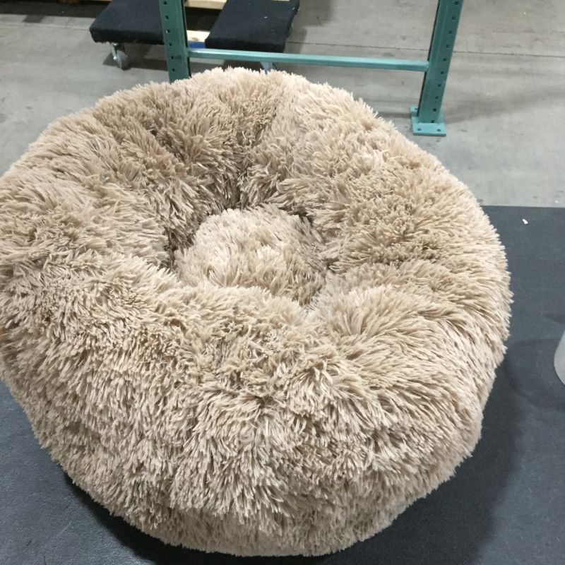 Photo 2 of Calming Dog Beds for Small Medium Large Dogs - Round Donut Dog Bed, Anti-Slip Faux Fur Fluffy Donut Cuddler Anxiety Cat Bed