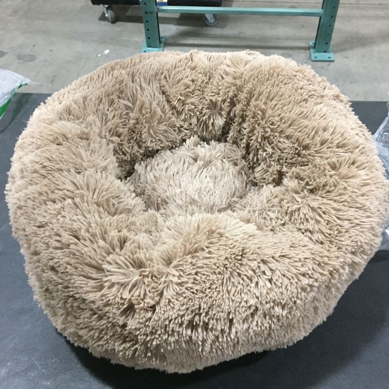 Photo 2 of  Calming Dog Beds for Small Medium Large Dogs - Round Donut  Dog Bed, Anti-Slip Faux Fur Fluffy Donut Cuddler Anxiety Cat Bed, Fits up to 15-100 lbs