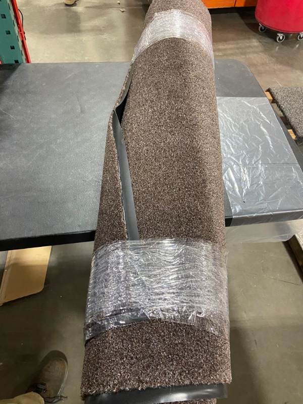 Photo 1 of 95*47 Brown Roll Out Mat w/ rubber bottom