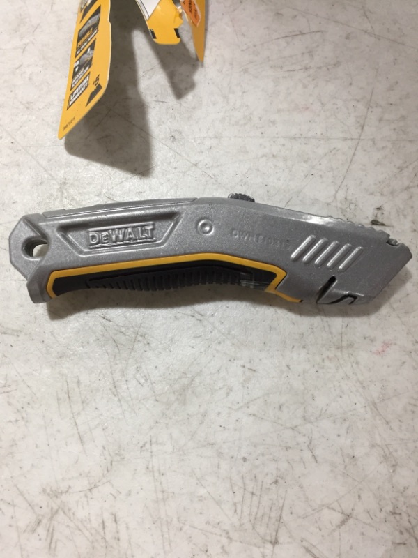 Photo 3 of DeWalt DWHT10319 Metal Retractable Utility Knife. OPEN PACKAGE.
