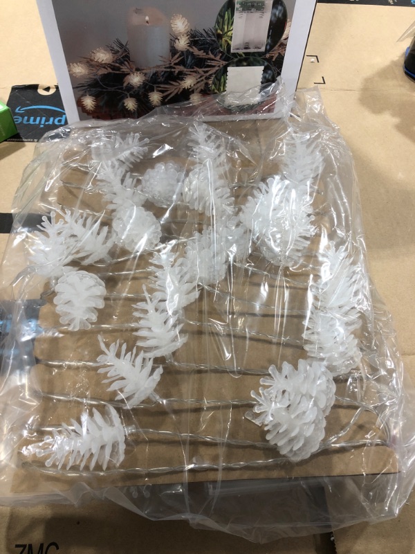 Photo 1 of Christmas Lights Christmas Indoor Decorations Pinecone String Lights with 50 Warm White LEDs Battery Operated

